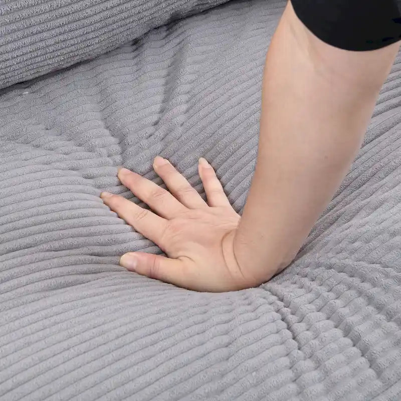 Canapé moderne tapissé avec 2 dossiers et coussins d'assise en mousse haute densité.