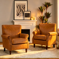 Fauteuil de style transitoire avec accoudoirs roulés