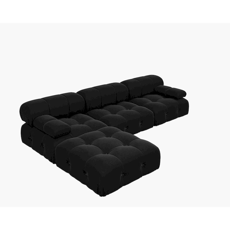 Canapé d'angle minimaliste en velours avec méridienne et pouf