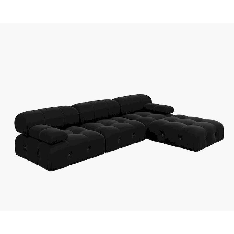 Canapé d'angle minimaliste en velours avec méridienne et pouf